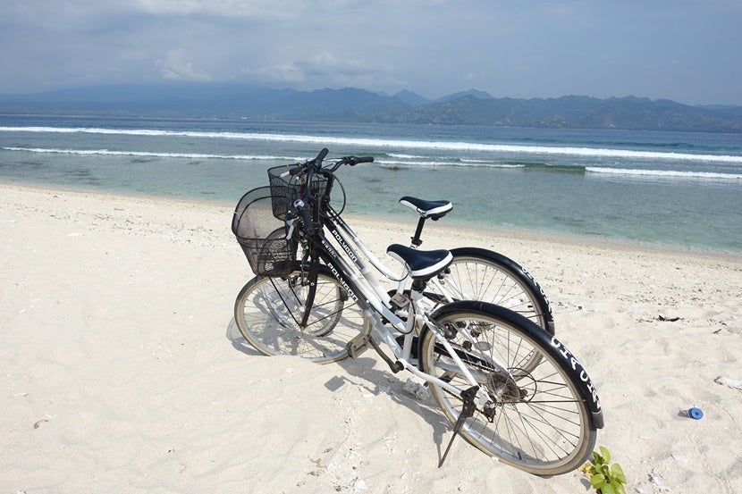 Rent bikes ride around the island. This should cost you between $3-$6 per day per bike.