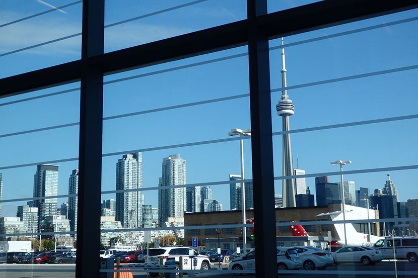 You can see most of the Toronto skyline and the CN Tower from the airport.