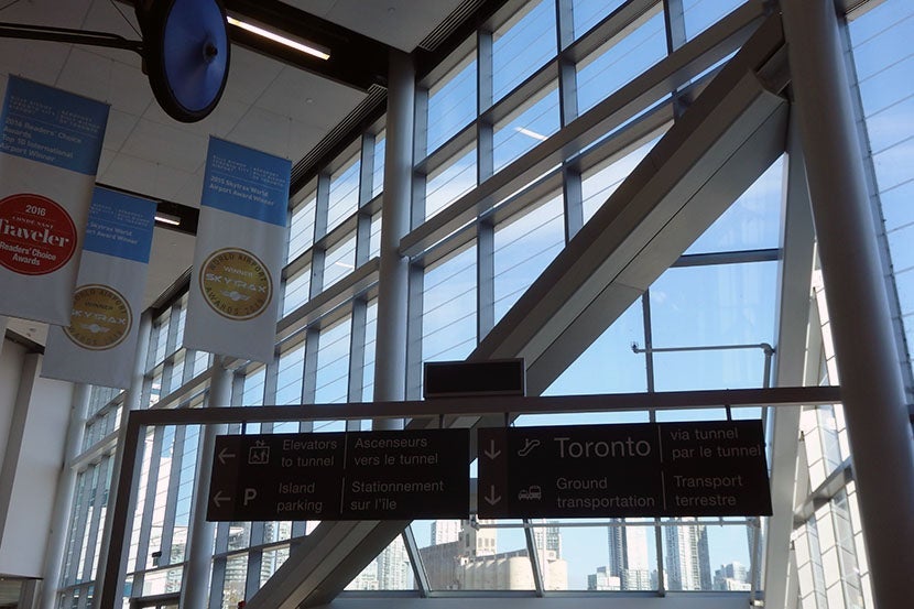 You can take a passenger tunnel, a shuttle, or ferry to downtown.