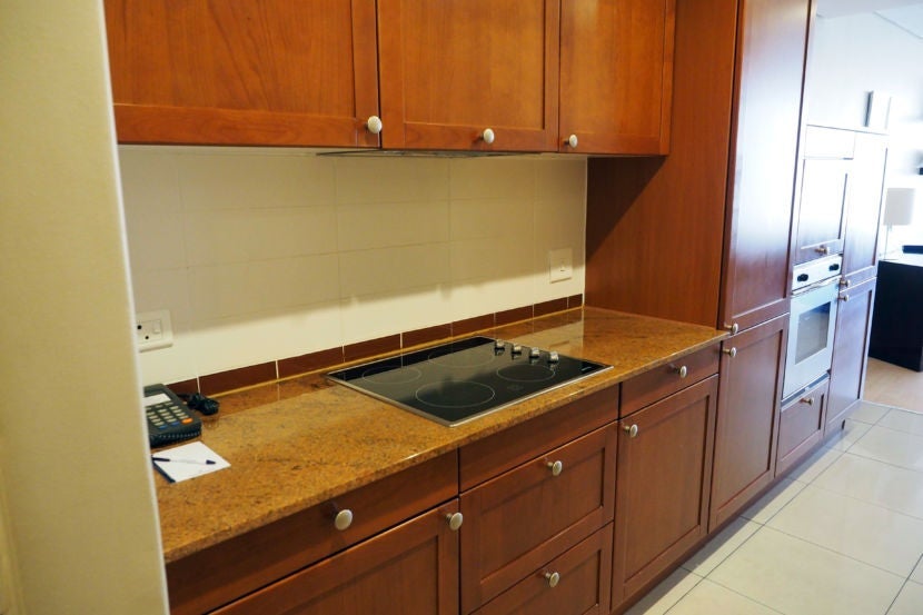 There was plenty of kitchen storage space, and a stovetop on the counter.