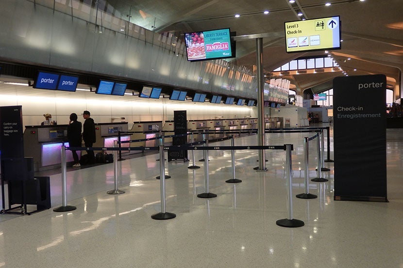 The Porter check-in desk at EWR, deserted on an early Sunday morning.
