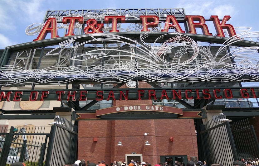 Visit AT&T Park and eat healthy in its in-stadium gardens. Image courtesy of <a href="http://www.shutterstock.com/pic-290367431/stock-photo-san-francisco-june-7-at-and-t-park-home-of-the-giants-neon-sign-during-day-as-people-enter-park-for-ballgame-june-7-2011-att-park-san-francisco-california.html?src=3xuHV9wURwDqYsMaTwyHiQ-1-12">Shutterstock</a>.