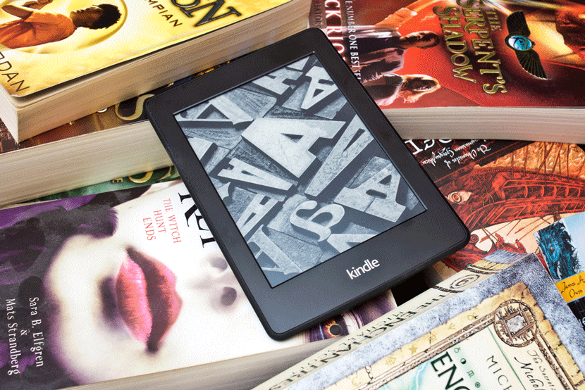 Are you a big reader? Consider getting an Amazon Kindle to lighten your load. Image courtesy of Shutterstock.