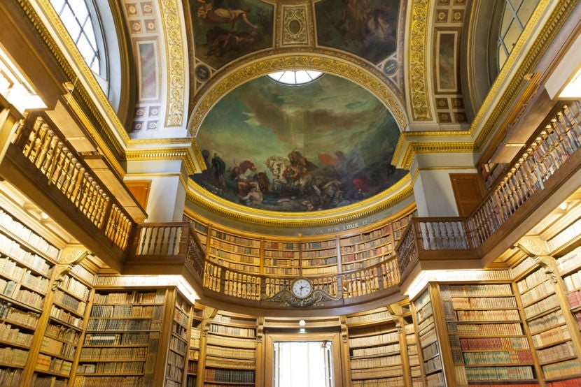 The library at the Assemblée Nationale, which features painted ceilings by Delacroix. Image courtesy of <a href="http://www.shutterstock.com/dl2_lim.mhtml?src=PzLPpkEF2fsLGFObYE6doQ-1-4&id=155492078&size=medium_jpg">Shutterstock</a>.