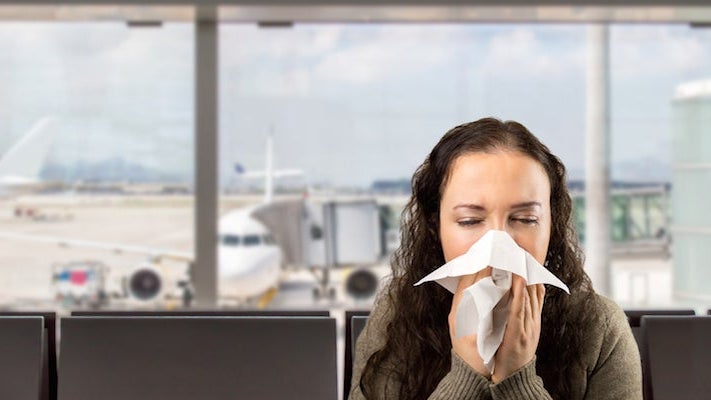 sick-passenger-airport-featured