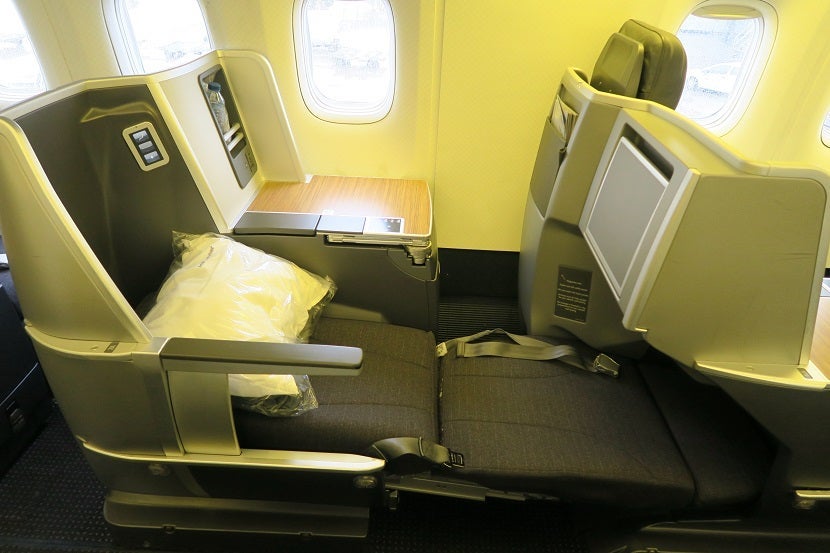 While seemingly not a full 180°, the seats recline into a nearly-flat bed.