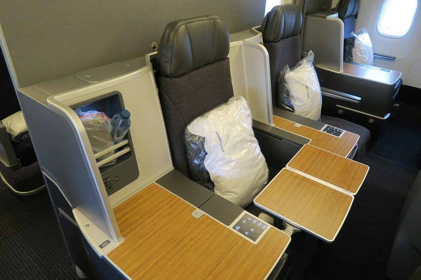 The rear middle seats shown with tray table extended.