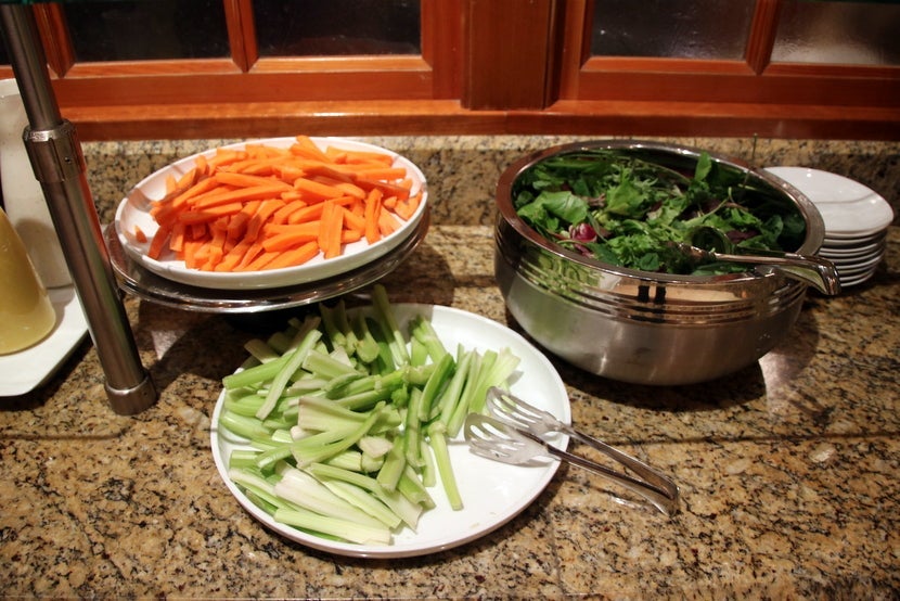 Carrots, celery and mixed greens for salad