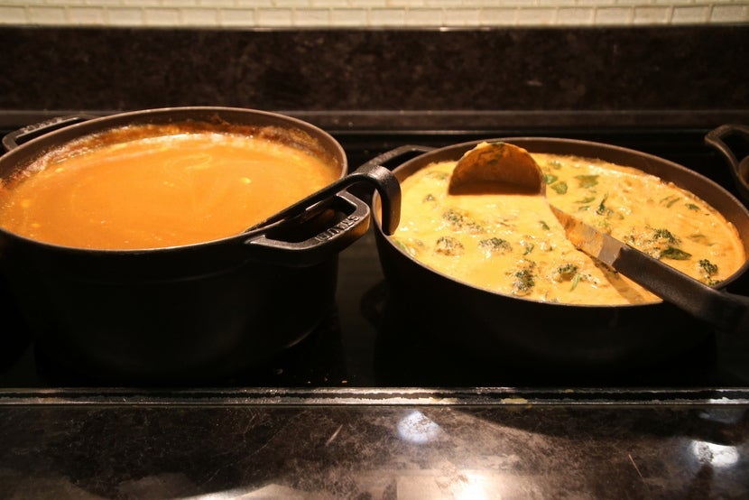 Butternut squash soup and shrimp, vegetables and red curry in coconut milk