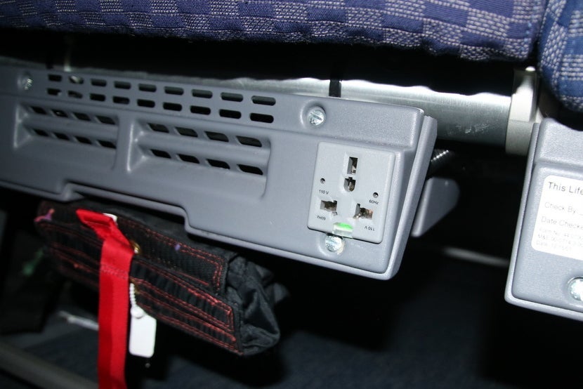 There were two universal plugs per row of three seats