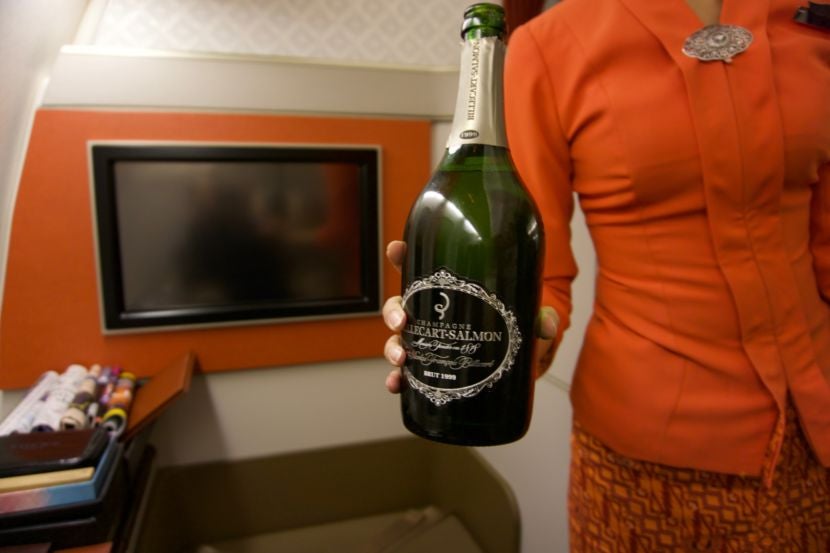 No arm twisting needed to have a glass of Champagne.