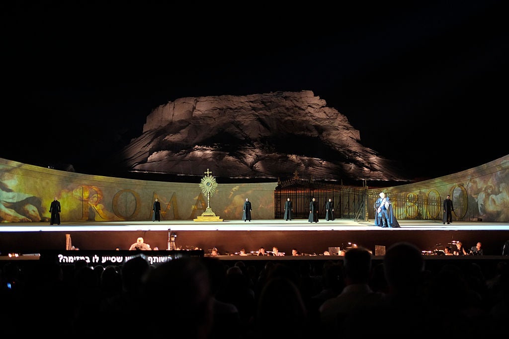 An opera about Rome about to be invaded by France set just below a fortress in Israel that was invaded by Rome — the ironies abound. Image courtesy of Eddie Gerald via Getty Images.