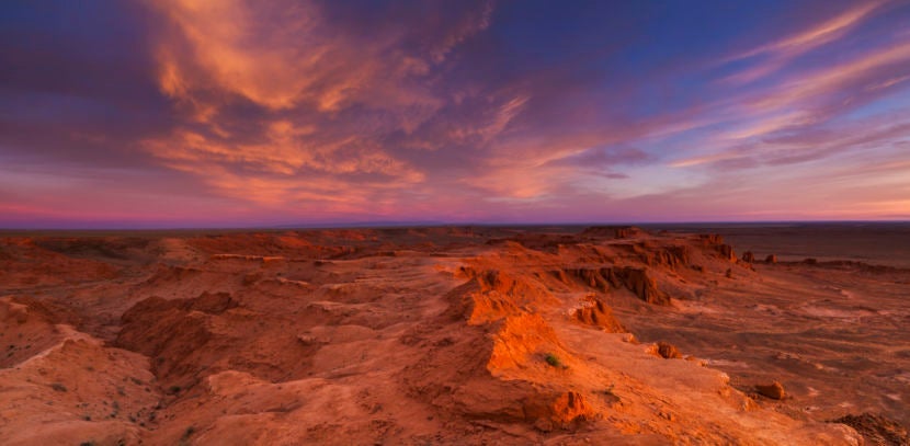 You might even discover dinosaur eggs at Mongolia's famous Flaming Cliffs. Image courtesy of Getty Images.
