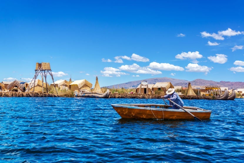 The famous floating villages of Lake Titicaca. Image courtesy of Getty Images.