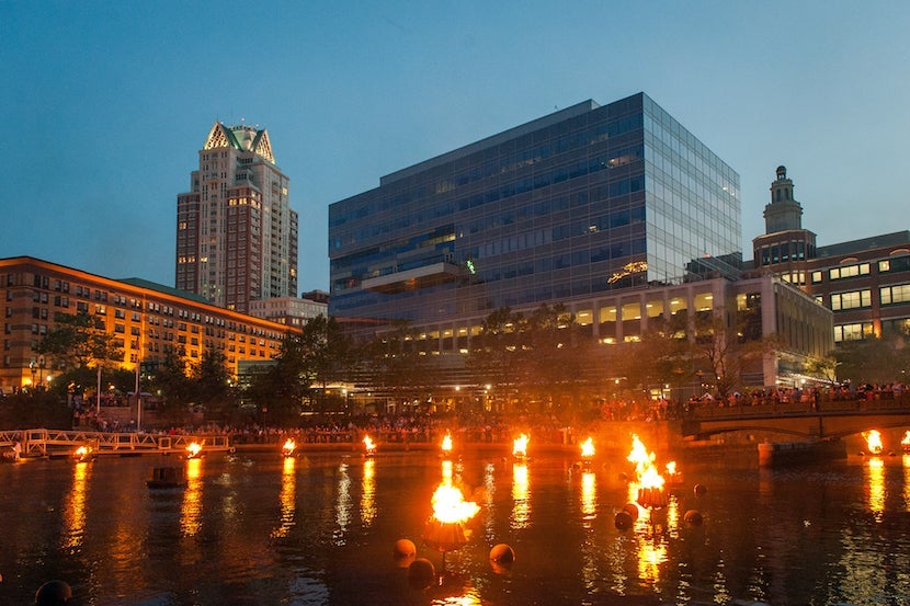 The rivers of Providence glow with WaterFire. Image courtesy of Yiming Chen via Getty Images.