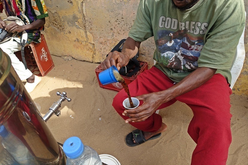 Being able to say a few words of French was really helpful when I inquired about the Senegalese custom of pouring coffee back and forth between two cups before drinking it. Image by the author.