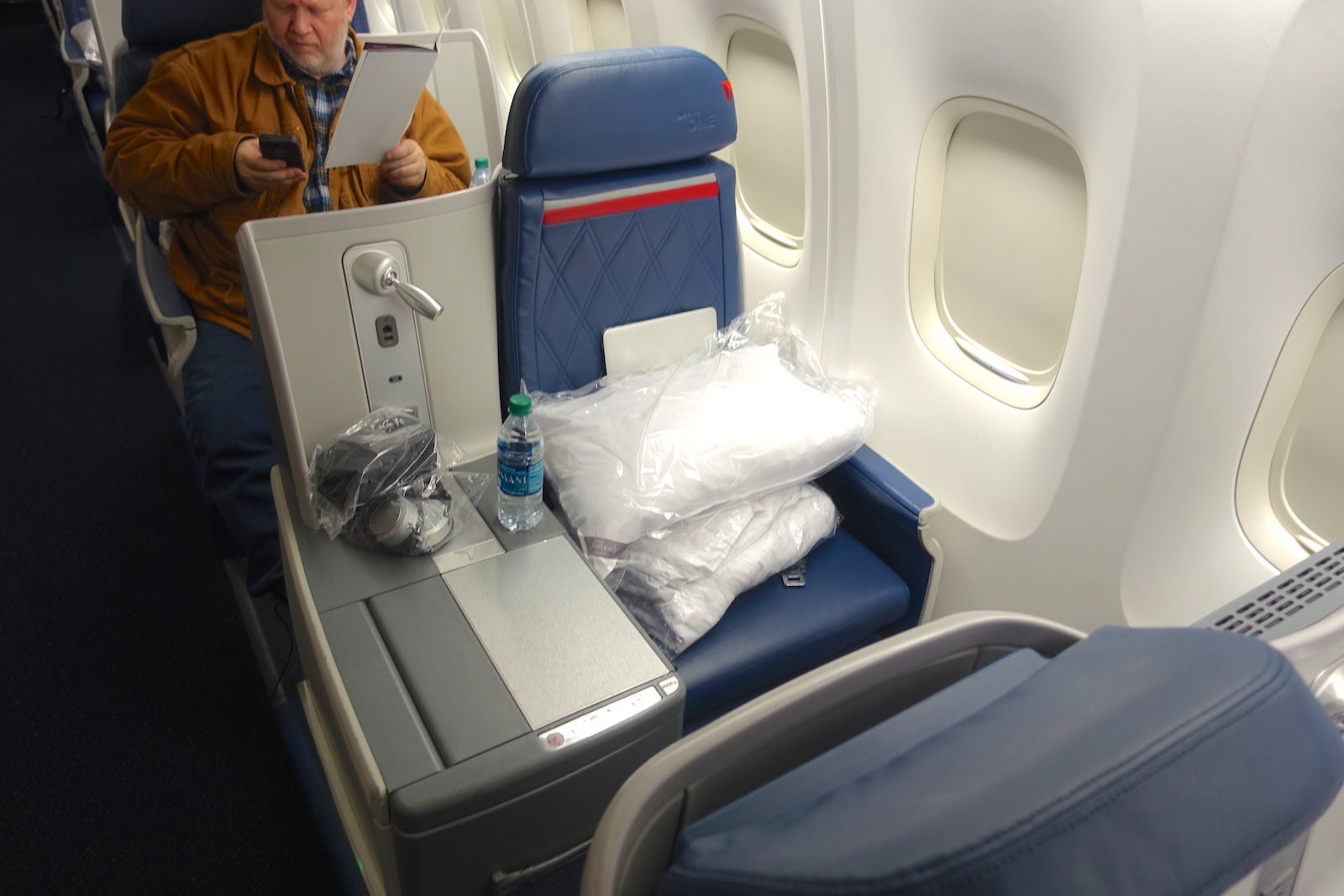 I chose an A seat because it was closer to the wall.