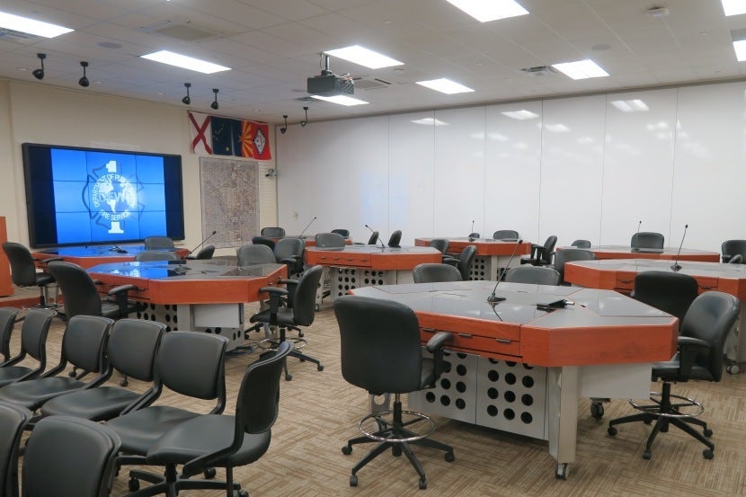 Interactive classroom in DFW FTRC. At each desk, trainees have their own touchscreen training system.
