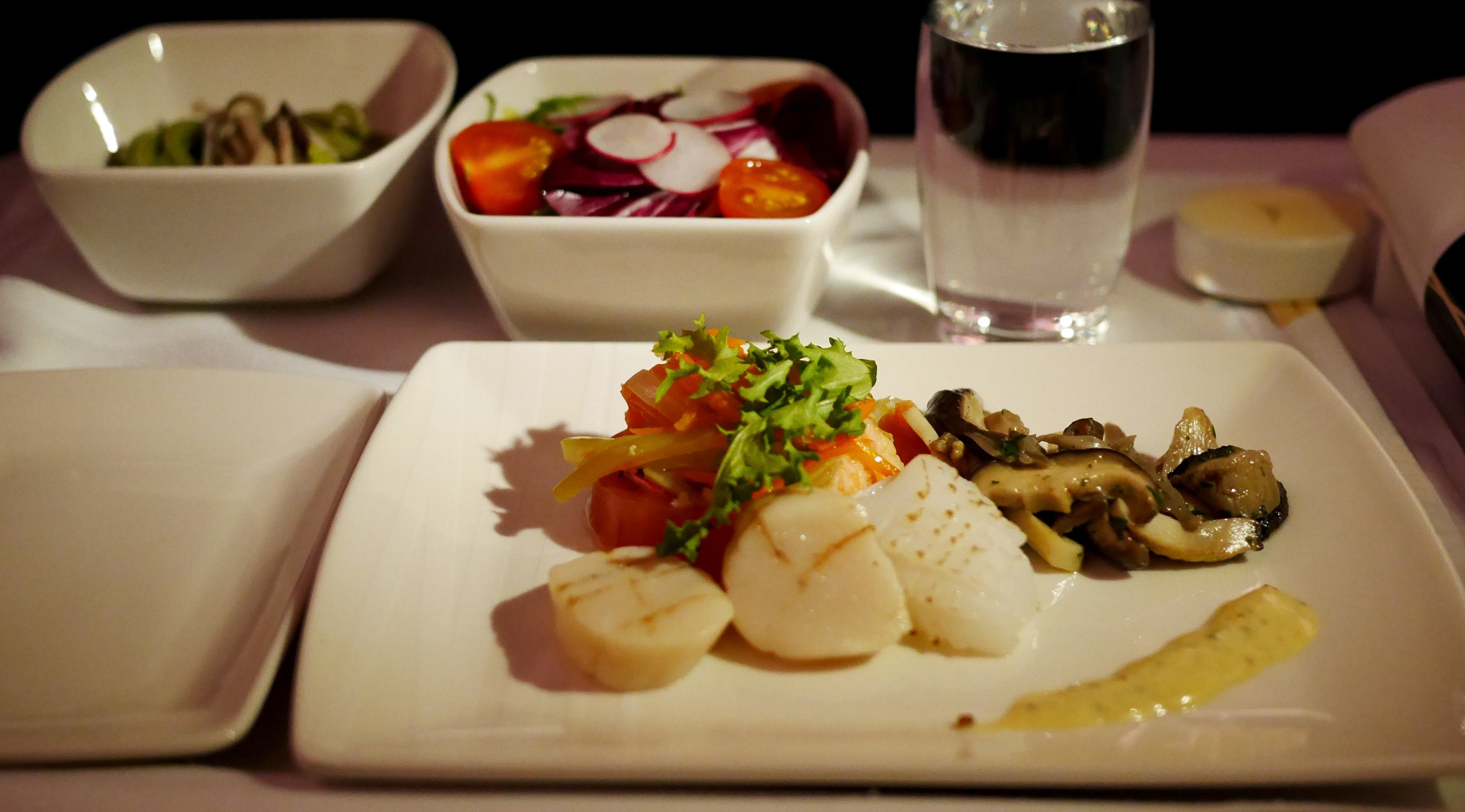 If you think this is what your meal will look like in economy, you'll leave the plane disappointed. Image courtesy of GelatoPlus via Getty Images.
