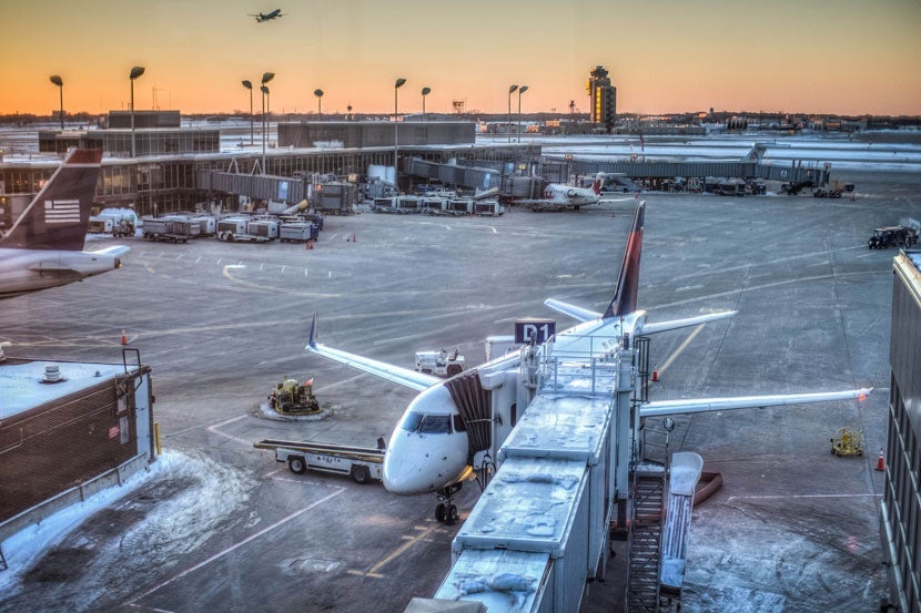A view of MSP airport from the "secret" observation deck near Concourse D. Image courtesy of m01229 via <a href="https://www.flickr.com/photos/39908901@N06/8487245657/in/photolist-dVZmrF-dW5XAN-rBbwpA-MSnnff-6bBSy8-dVVCHT-dVZnXF-dW5Ypo-6hGcSv-q7H7n" target="_blank">Flickr</a>.
