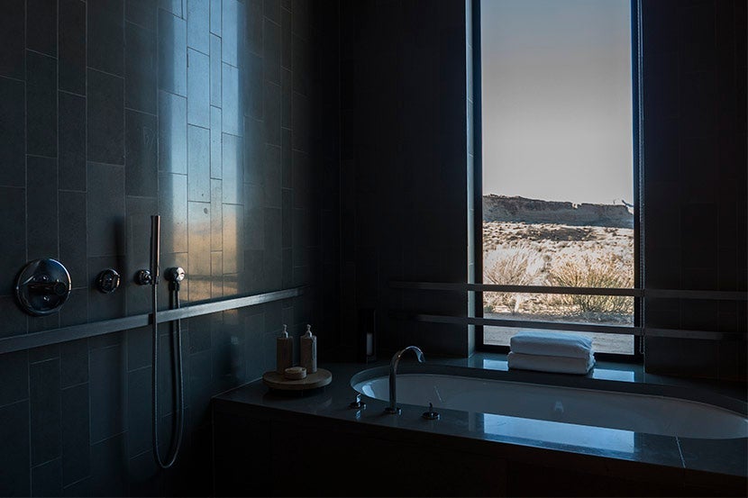 The view from the tub is impressive, but house rules forbid anyone from exploring the landscape outside, so you needn't be shy.