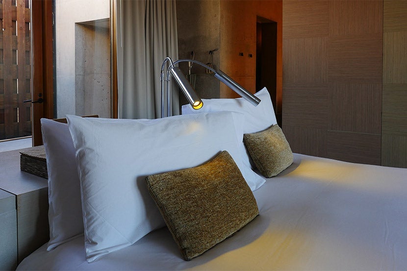 Bizarrely, the bed is two mattresses combined, not a king mattress. Unforgivable at this price point.