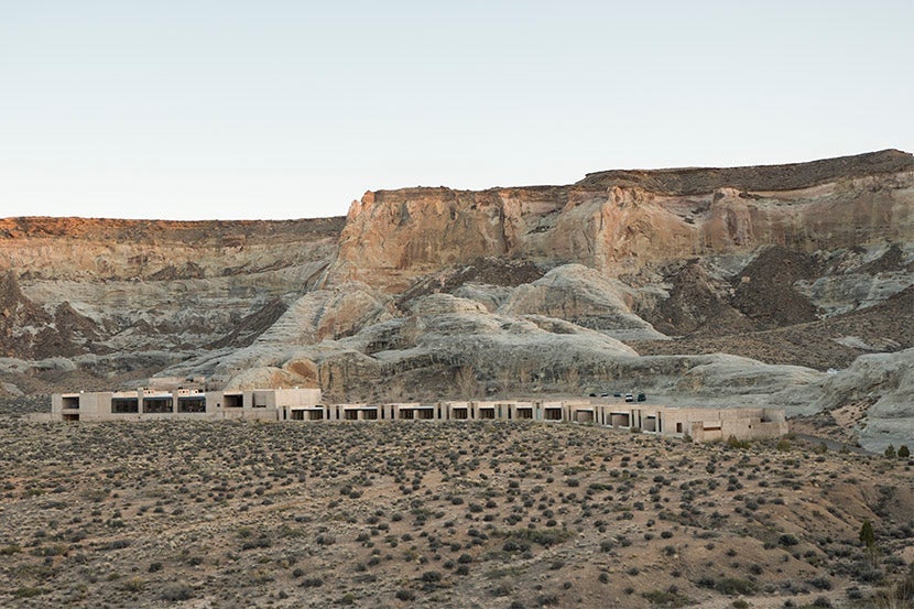 The unusual architecture is somewhere between prison and paradise. Its natural color palette almost blends in with the surroundings.
