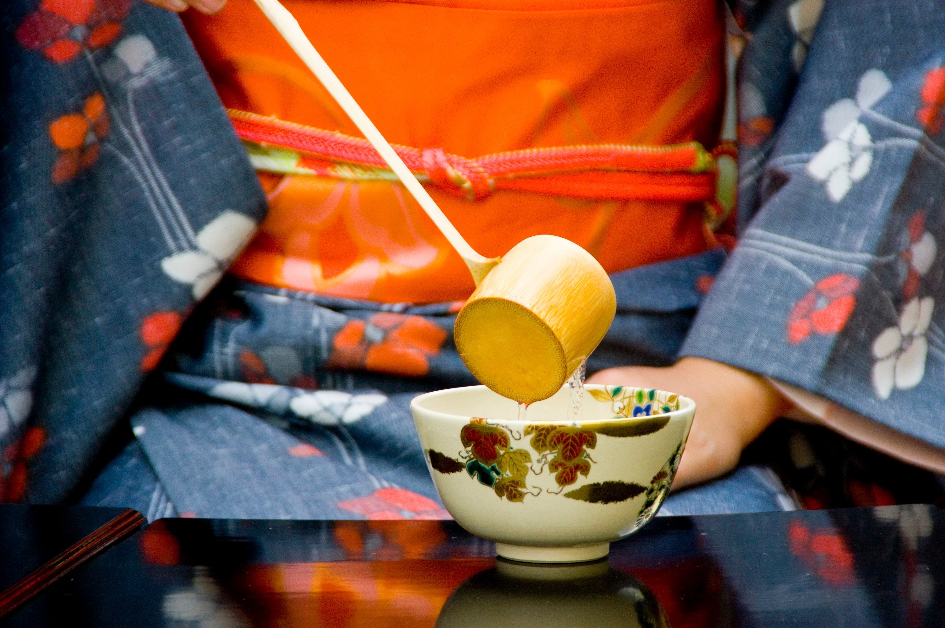 The Japanese tea ceremony is reverent, meticulous and totally worth the experience. Image courtesy of Brian Kennedy via Getty Images.