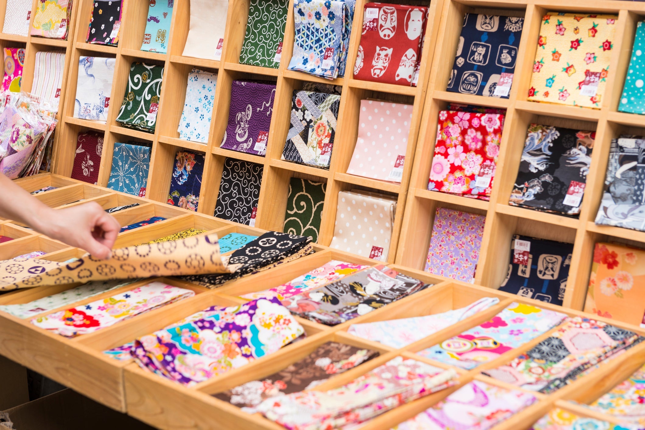 Fabric is an art form in Japan, as is evidenced by the attention paid to making and buying <em>tenugui</em>, an all-purpose printed towel or cloth square. Image courtesy of helovi via Getty Images.