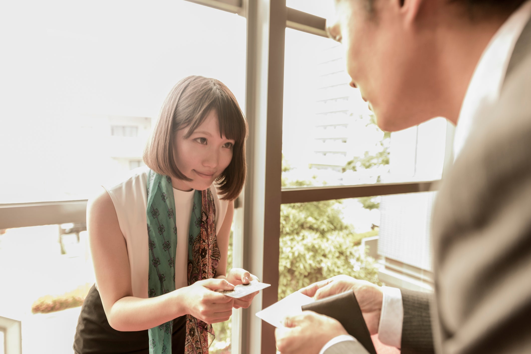 And always use both hands when exchanging business cards in Japan. Image courtesy of Johnny Greig via Getty Images.