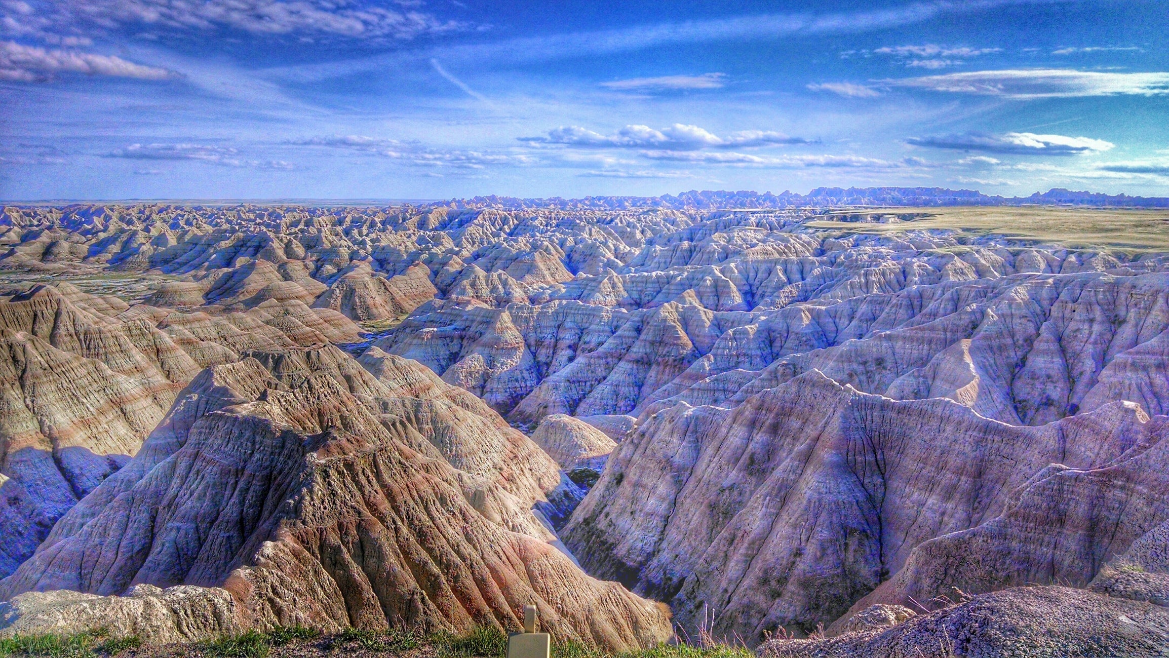 Fly into Rapid City, South Dakota, and visit Badlands National Park. (Photo by Andrew Nay / EyeEm / Getty Images)