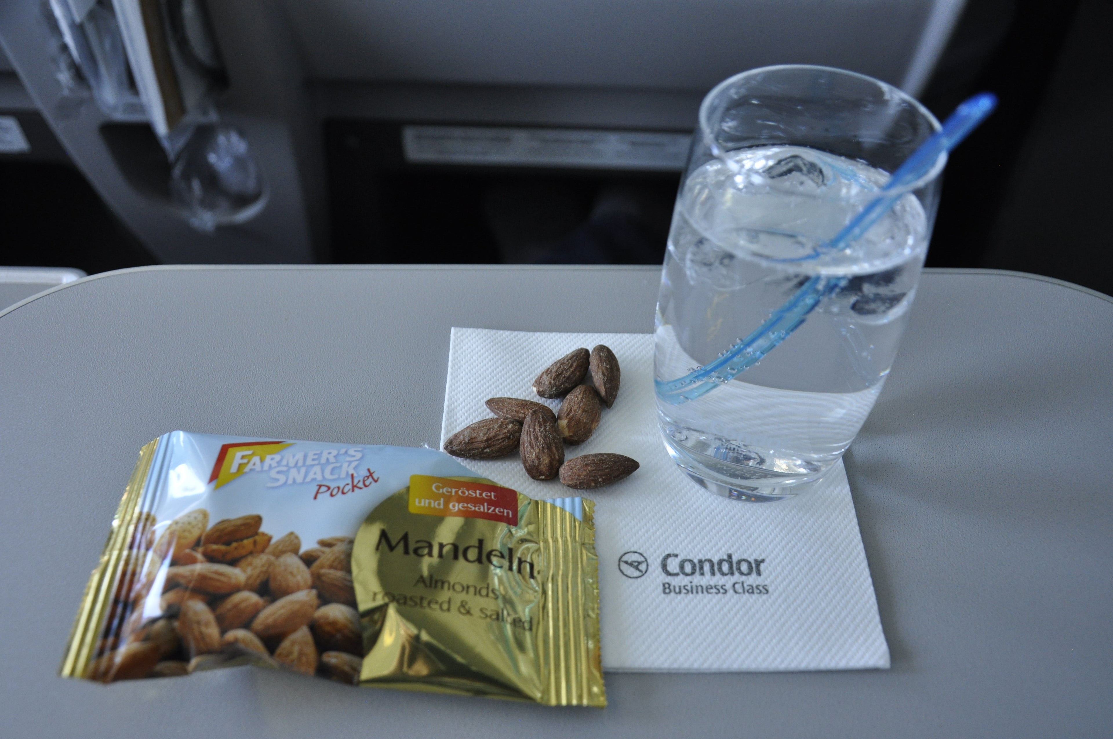 Bombay Sapphire gin & tonic, served with almonds