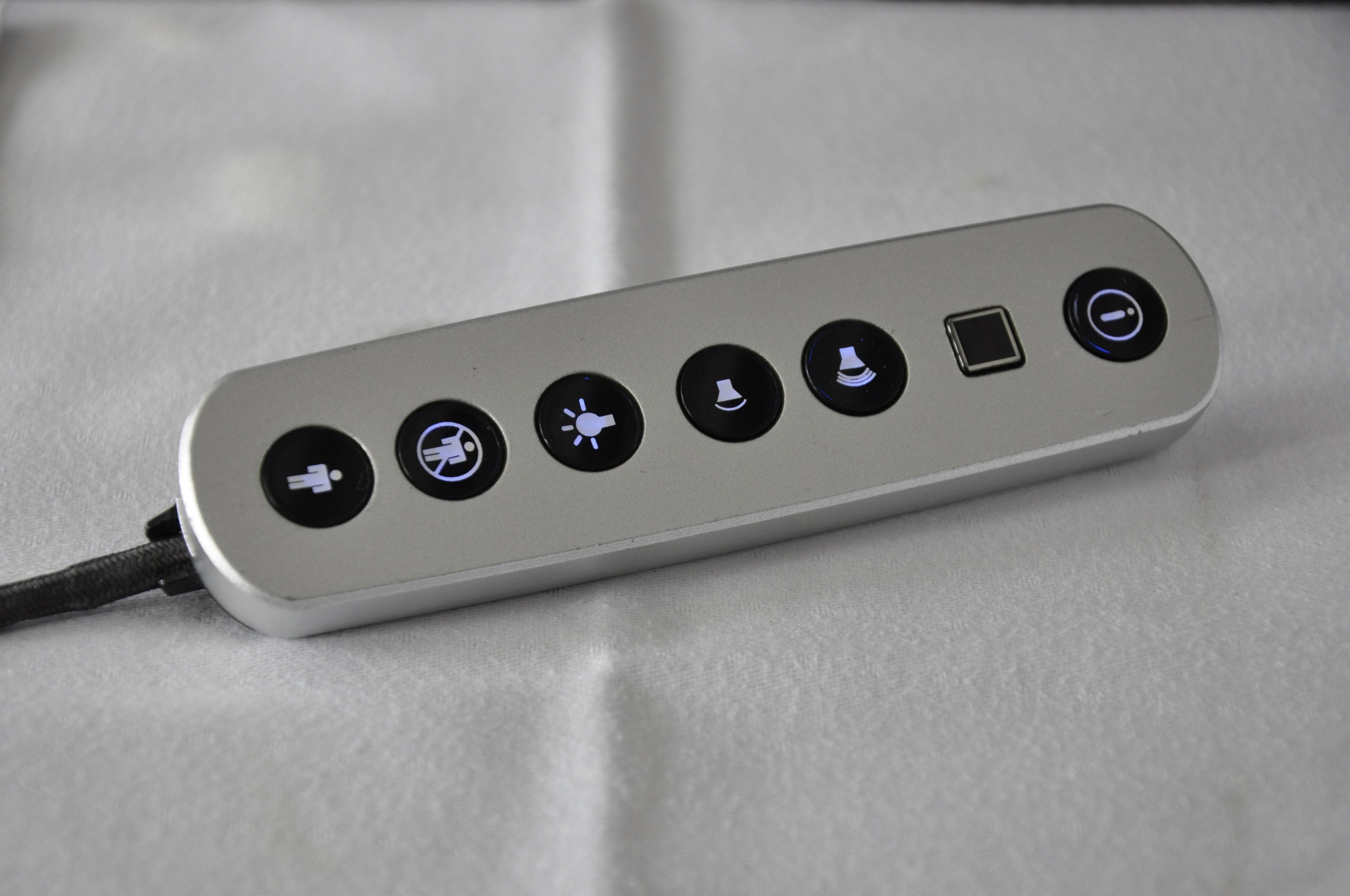 The IFE controller in Condor Business Class resembled the Apple TV remote.
