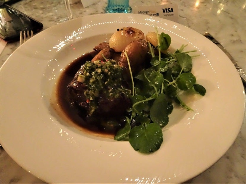 The huge portion of angus short rib with crispy fingerlings, cipollini, watercress and chimichurri.