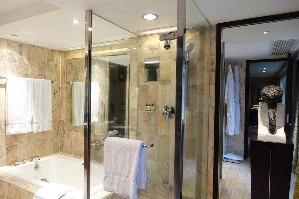 Shower, tub and sculpture