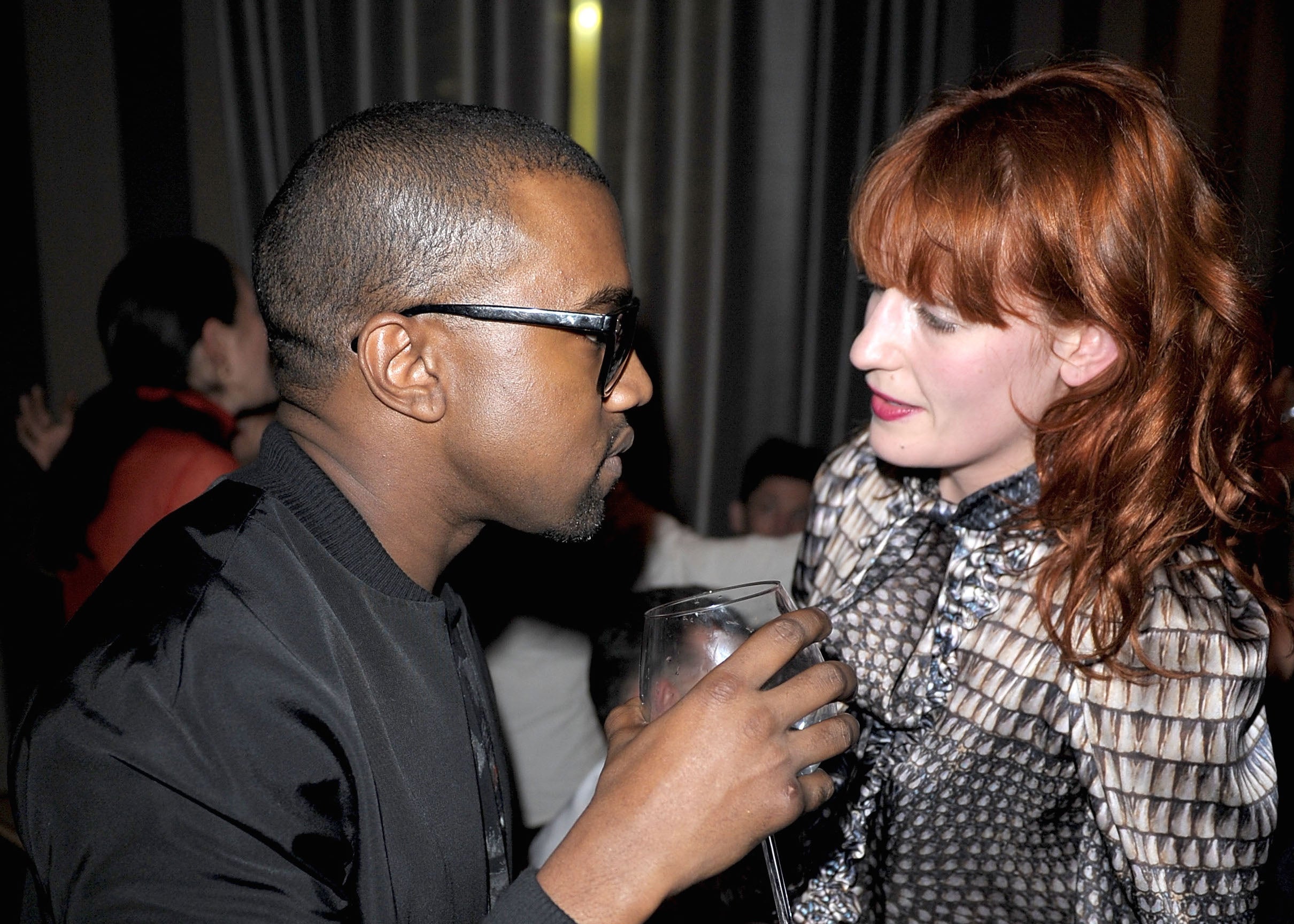 Kanye West, dirty martinis and one cinnamon tea light added up to a hotel room fire for Florence Welch. Image courtesy of Trago/WireImage via Getty Images.