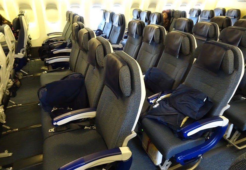 Four seats in the center in Economy.