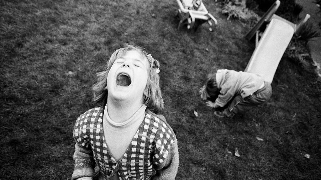 England - London - Young girl throws tantrum during garden game