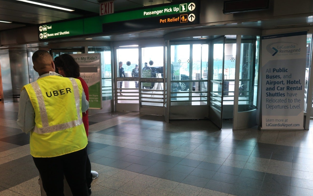 LGA Uber rep and sign about changes