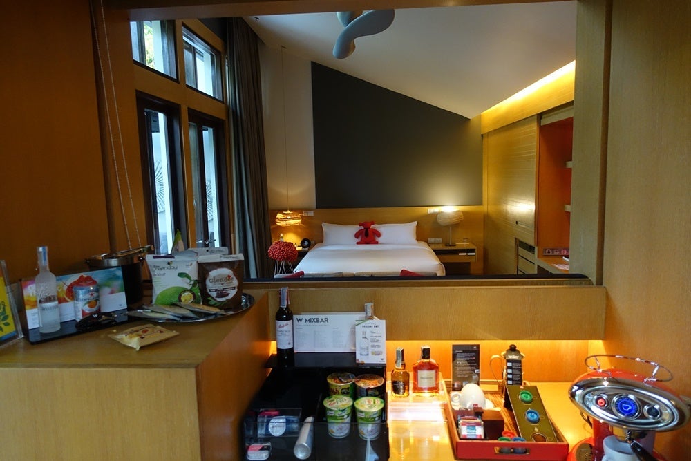 The mini bar and coffee maker.