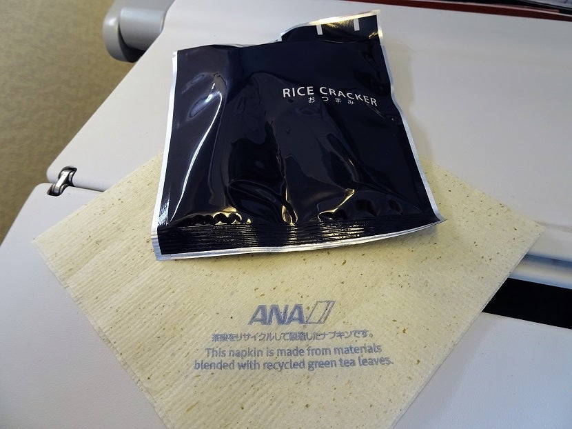 Rice crackers and an environmentally friendly napkin.