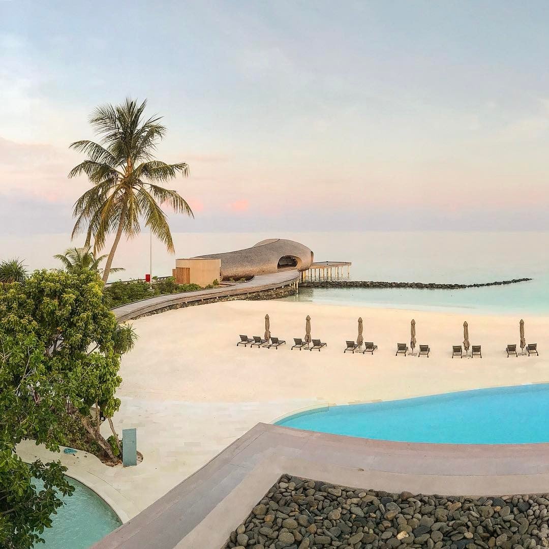 Gold elites get Marriott and SPG Gold status through RewardsPlus, earning you extra points and perks at hotels like the St. Regis Maldives.