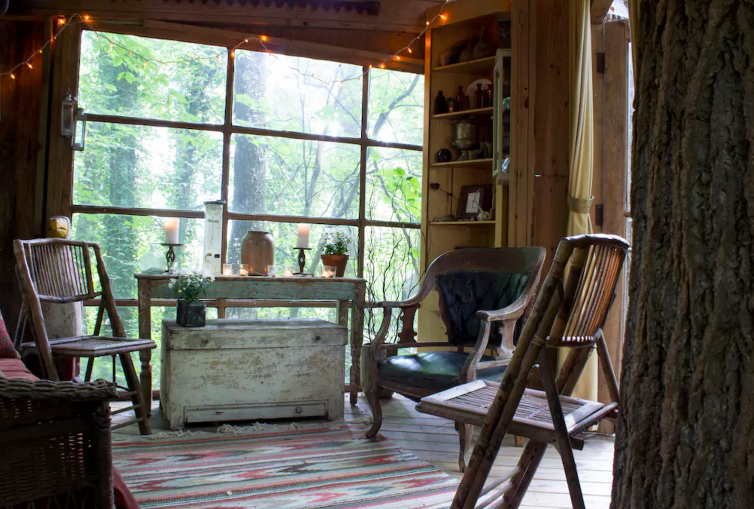 The tree house is filled with antique furniture and classic design elements. Photo courtesy of Airbnb.