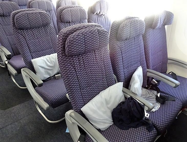 Rows of Economy Plus seats on the Dreamliner.