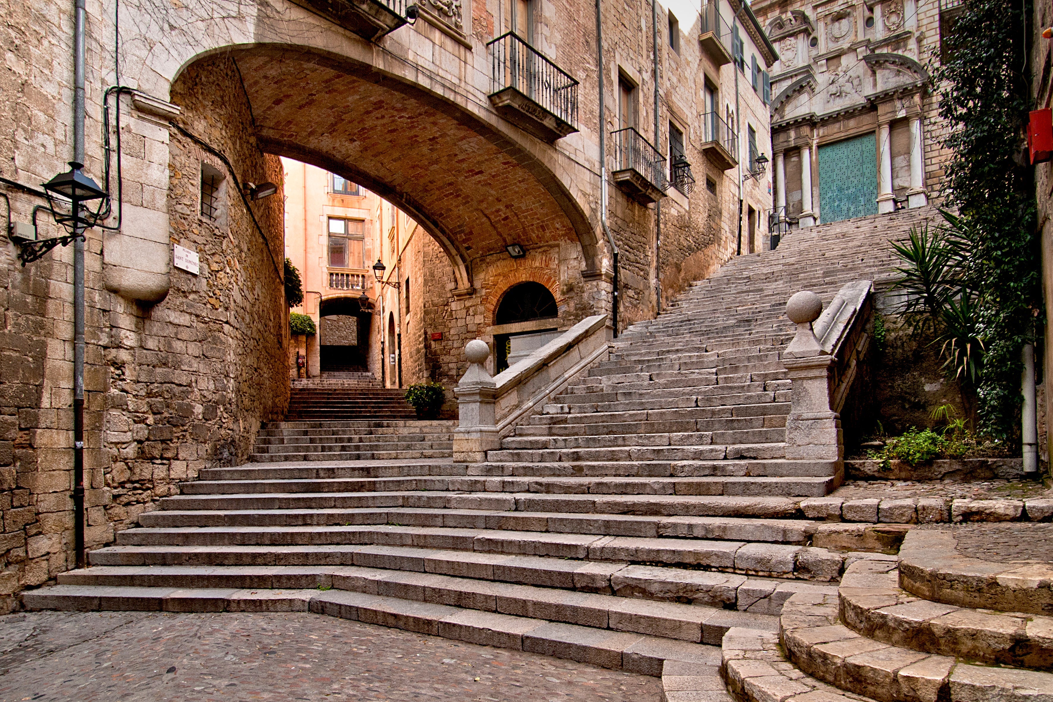 The medieval streets of Girona, which doubled as parts of King's Landing. Image courtesy of Ramon Roura via Getty Images.