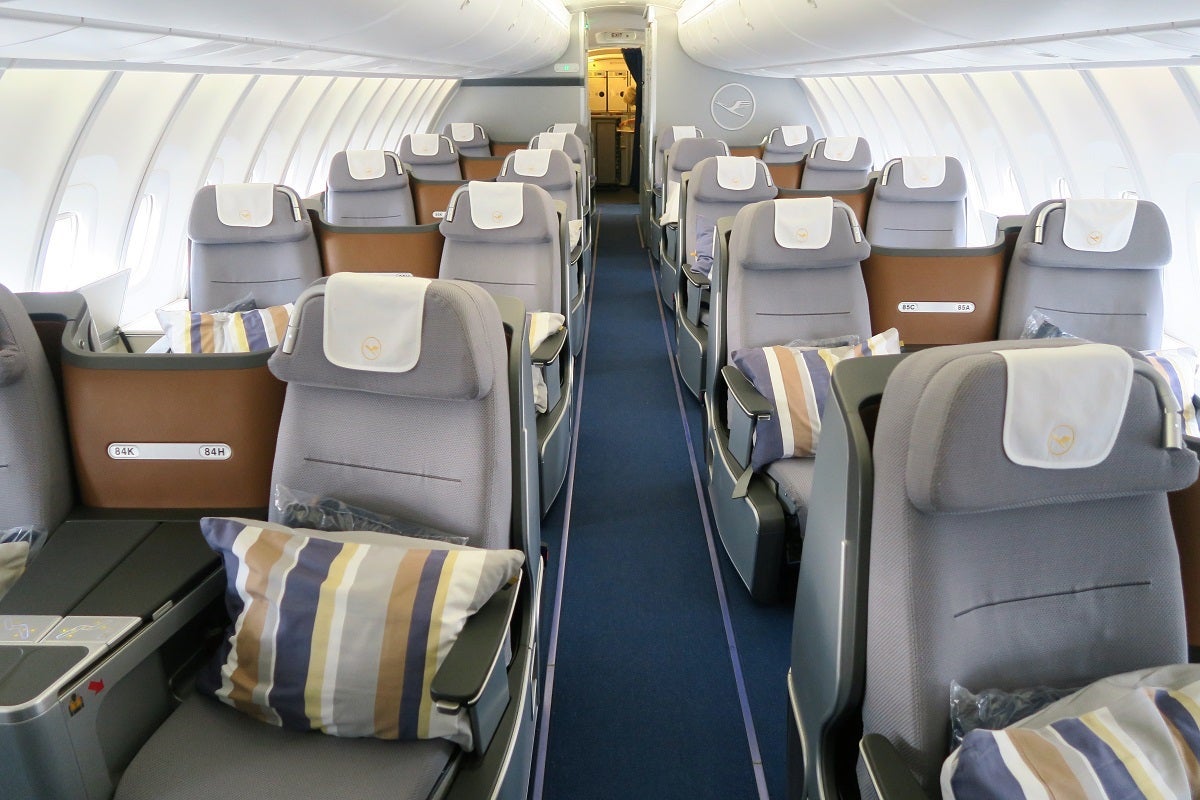 The upper deck of a Lufthansa 747-8, configured in a 2-2 business-class layout (Photo by JT Genter/TPG)