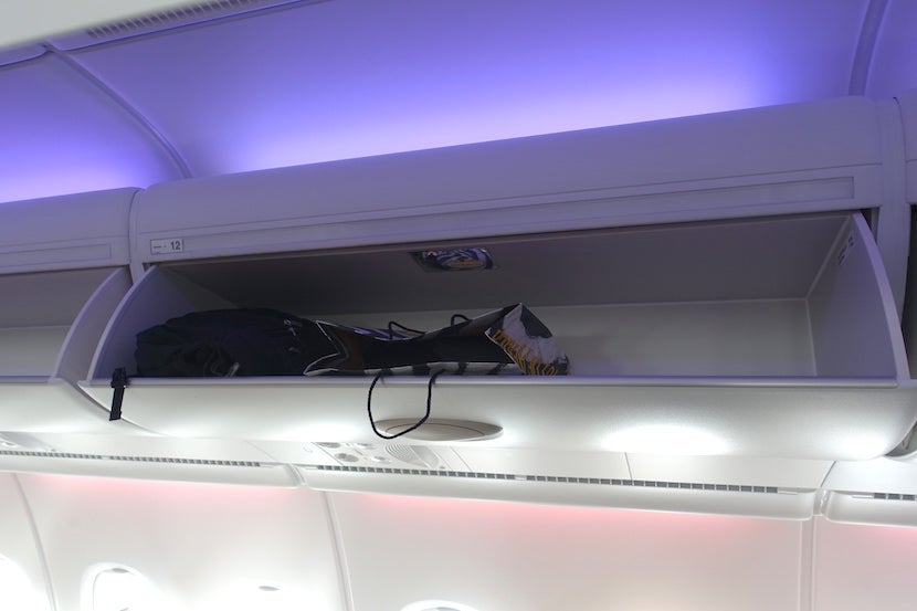 Qatar side overhead bins