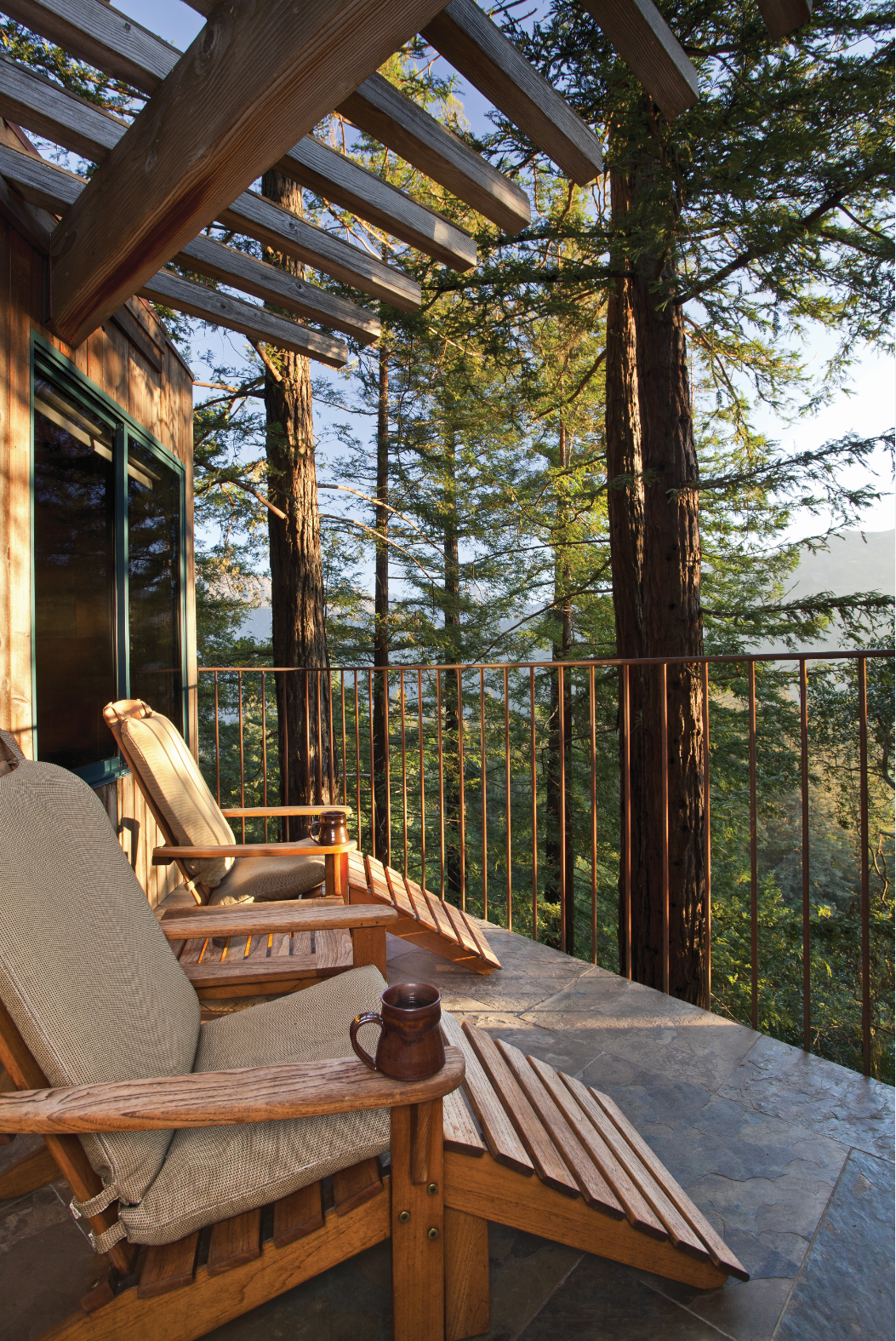 The deck has custom wooden seating for two. Image courtesy of Kodiak Greenwood.