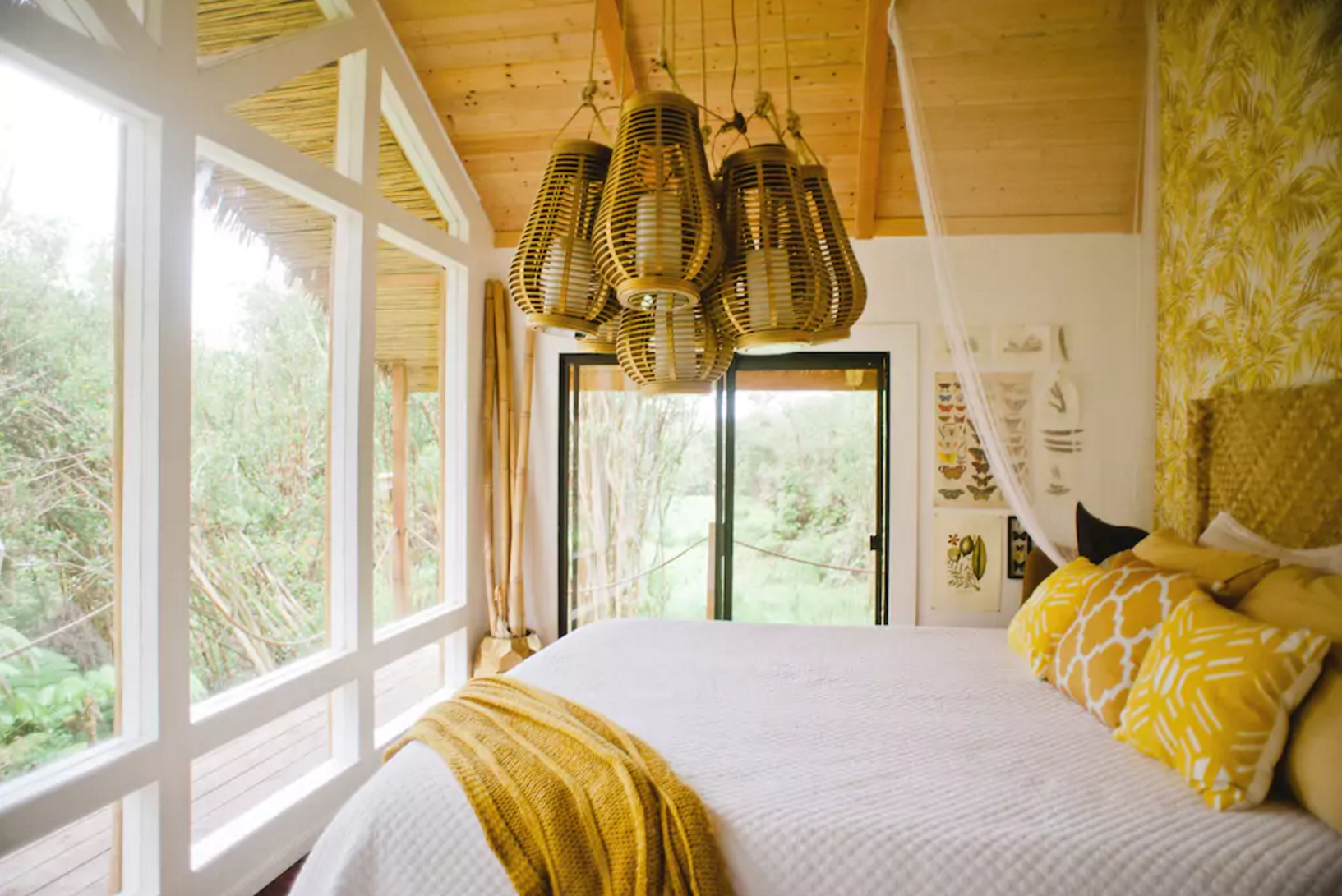 The upstairs bedroom has huge windows which allow light to fill the room. Photo courtesy of Airbnb.