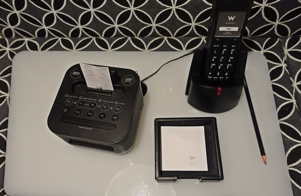 The alarm clock and phone.